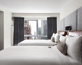 Day use room with large windows and natural light at Hotel 48LEX New York.