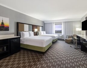 Day use room with work desk at Best Western Premier NYC Gateway.