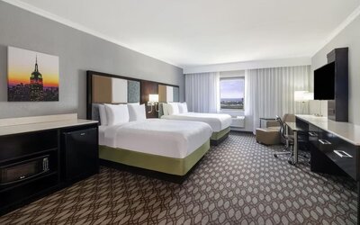 Day use room with work desk at Best Western Premier NYC Gateway.