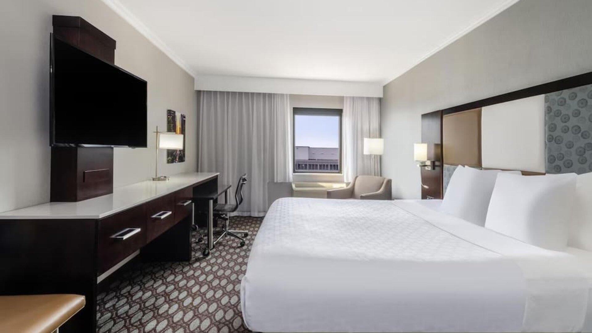 Day use room with work desk at Best Western Premier NYC Gateway.