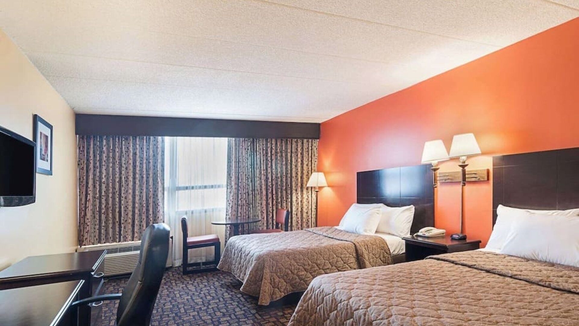 Day use room with work desk at Rodeway Inn Meadowlands.