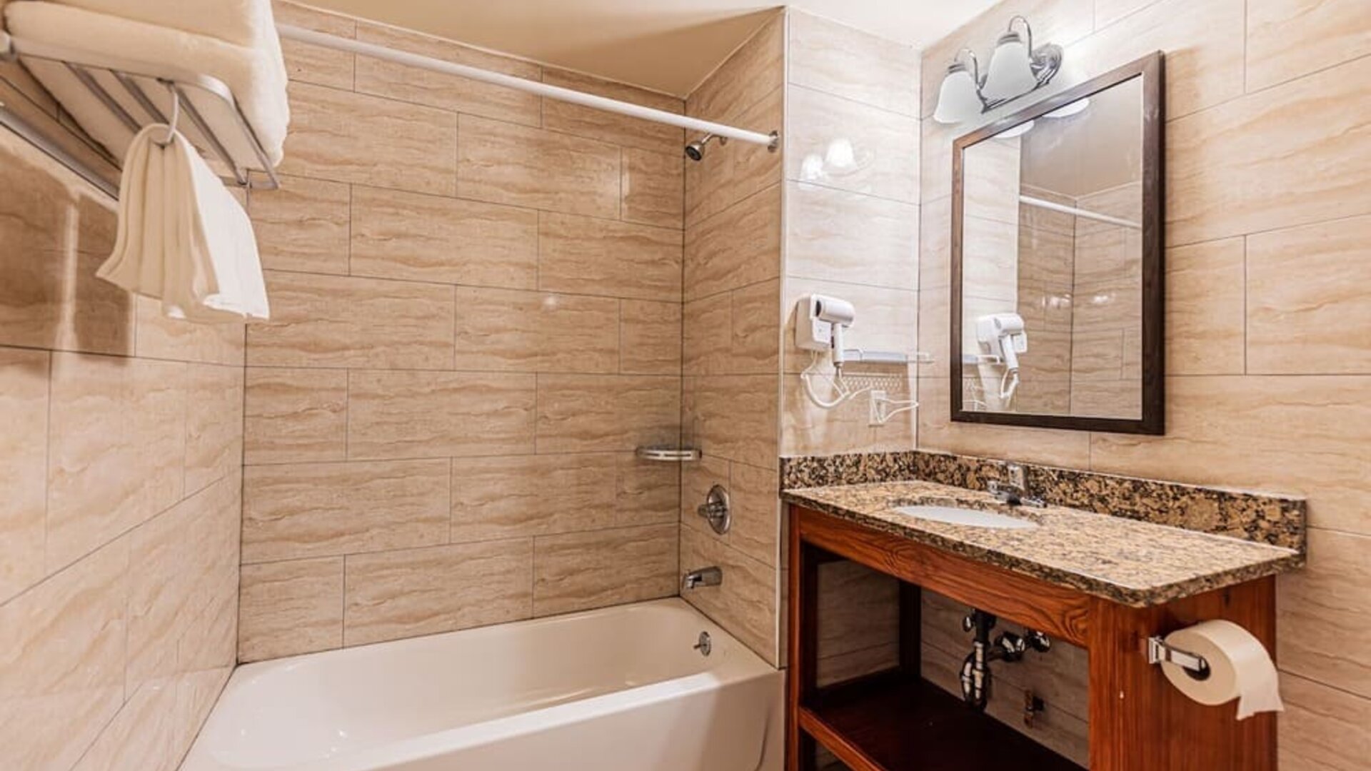 Bathroom at Astoria Inn LaGuardia Hotel.