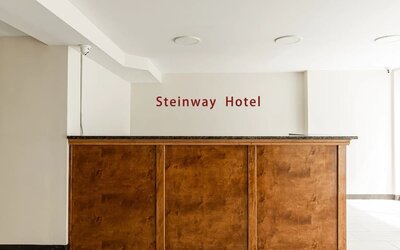 Reception at Astoria Inn LaGuardia Hotel.