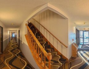 Lobby at Coratel Inn & Suites By Jasper Hastings.