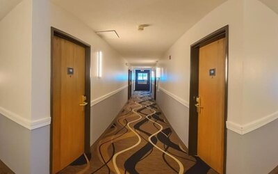 Lobby at Coratel Inn & Suites By Jasper Hastings.