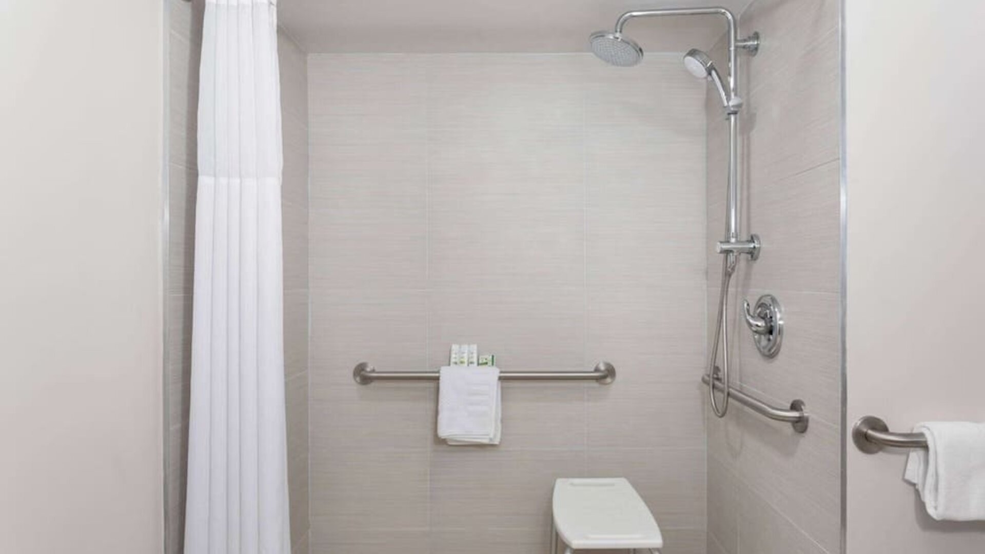 Bathroom at Travelodge by Wyndham Fundamental.