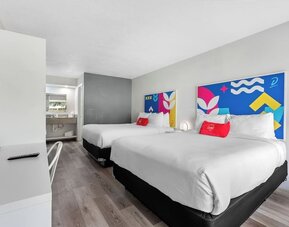 Day room with workspace at Baymont by Wyndham Maingate.