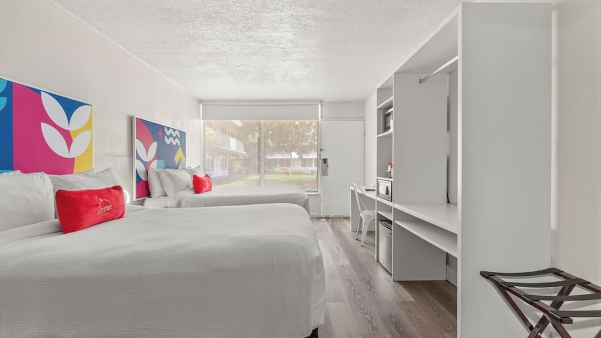 Day room with workspace and natural light at Baymont by Wyndham Maingate.