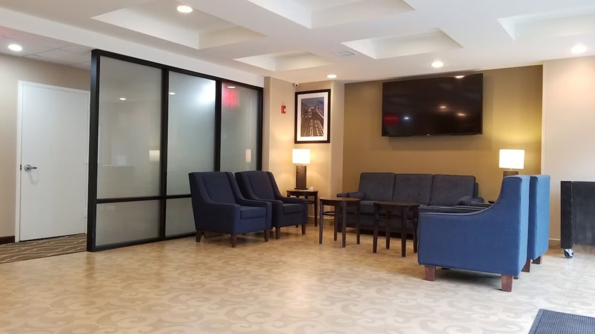 Lobby lounge area at Days Inn By Wyndham Brooklyn Marine Park.