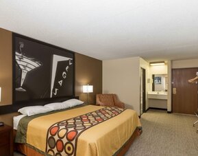 Day room with couch at Coratel Inn And Suites By Jasper Wichita North.