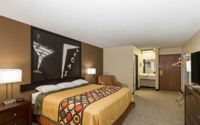 Day room with couch at Coratel Inn And Suites By Jasper Wichita North.