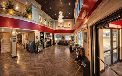 Lobby area with seating at Coratel Inn And Suites By Jasper Wichita North.