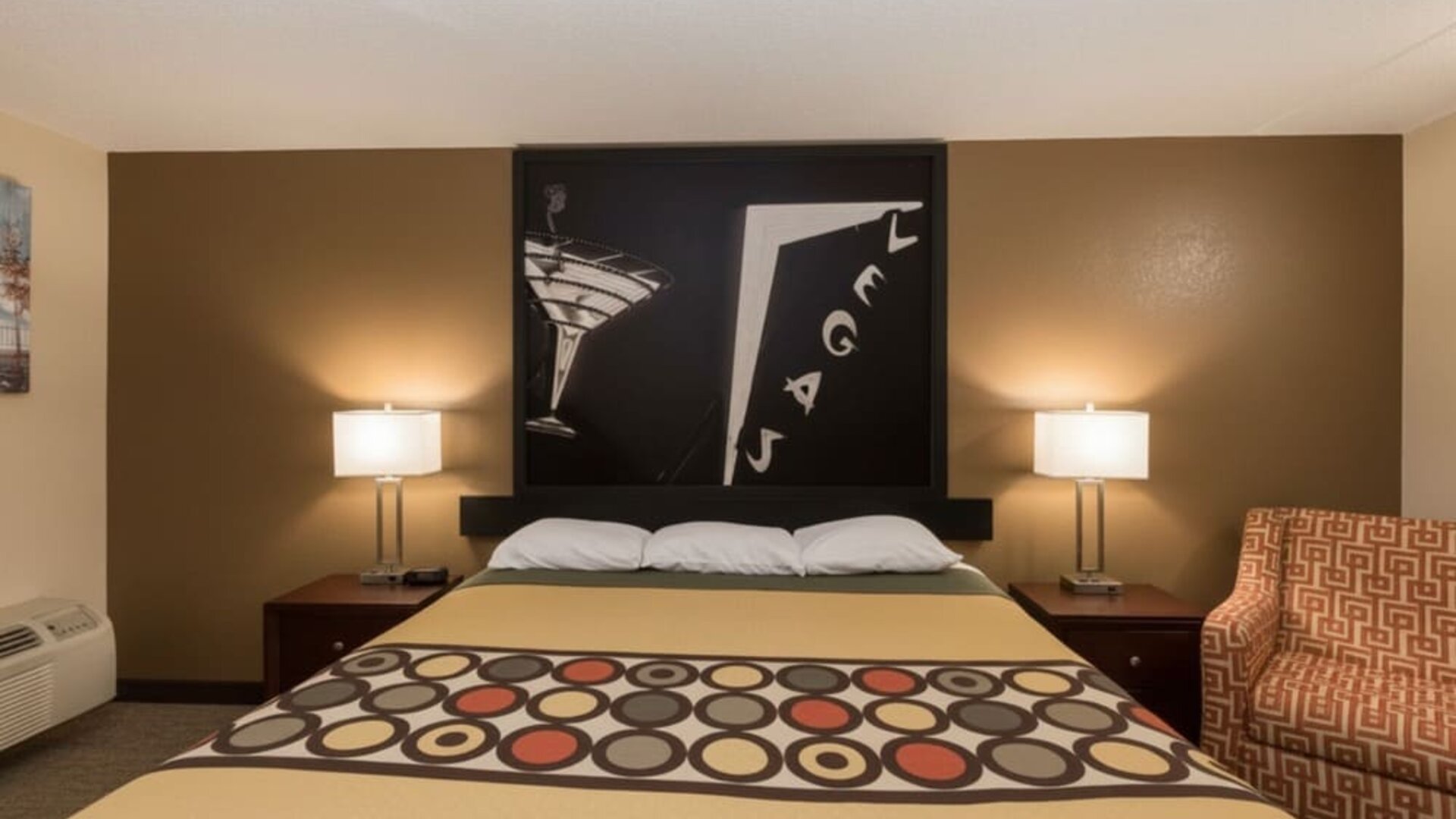 Day room with couch at Coratel Inn And Suites By Jasper Wichita North.