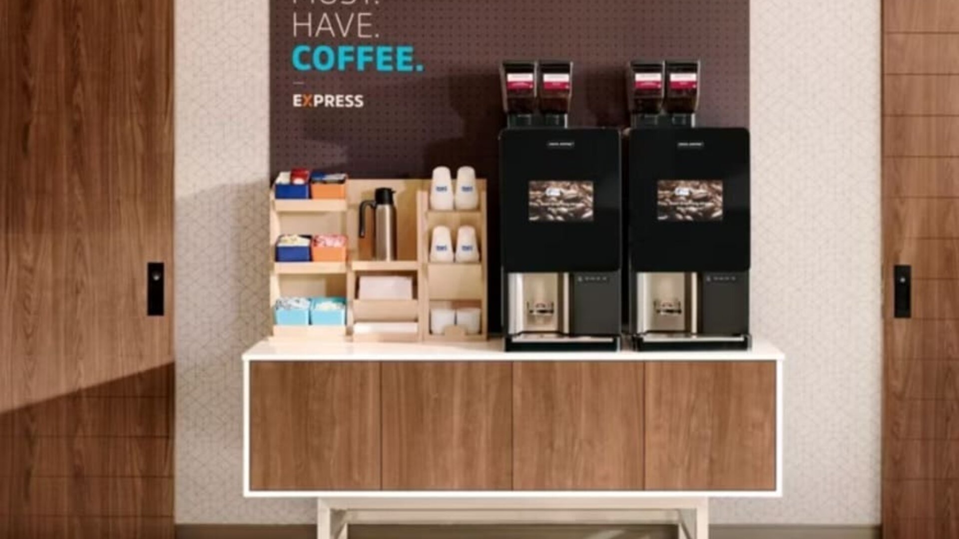 Coffee station at Holiday Inn Express Chicago - Downers Grove.