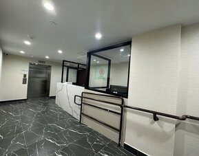 Reception area at Regal Inn & Suites New York.