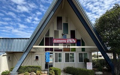 Hotel exterior at Economy Inn.