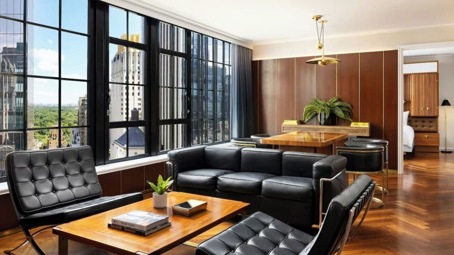 Lounge seating area with chairs and table setup at Le Méridien New York, Central Park.