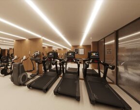 Fitness center with treadmills at DoubleTree By Hilton Wilkes-Barre.