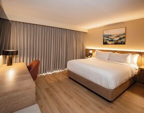 Day use room with TV and work desk at DoubleTree By Hilton Wilkes-Barre.