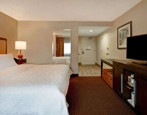 King room with TV and private bathroom at Hampton Inn NY-JFK.
