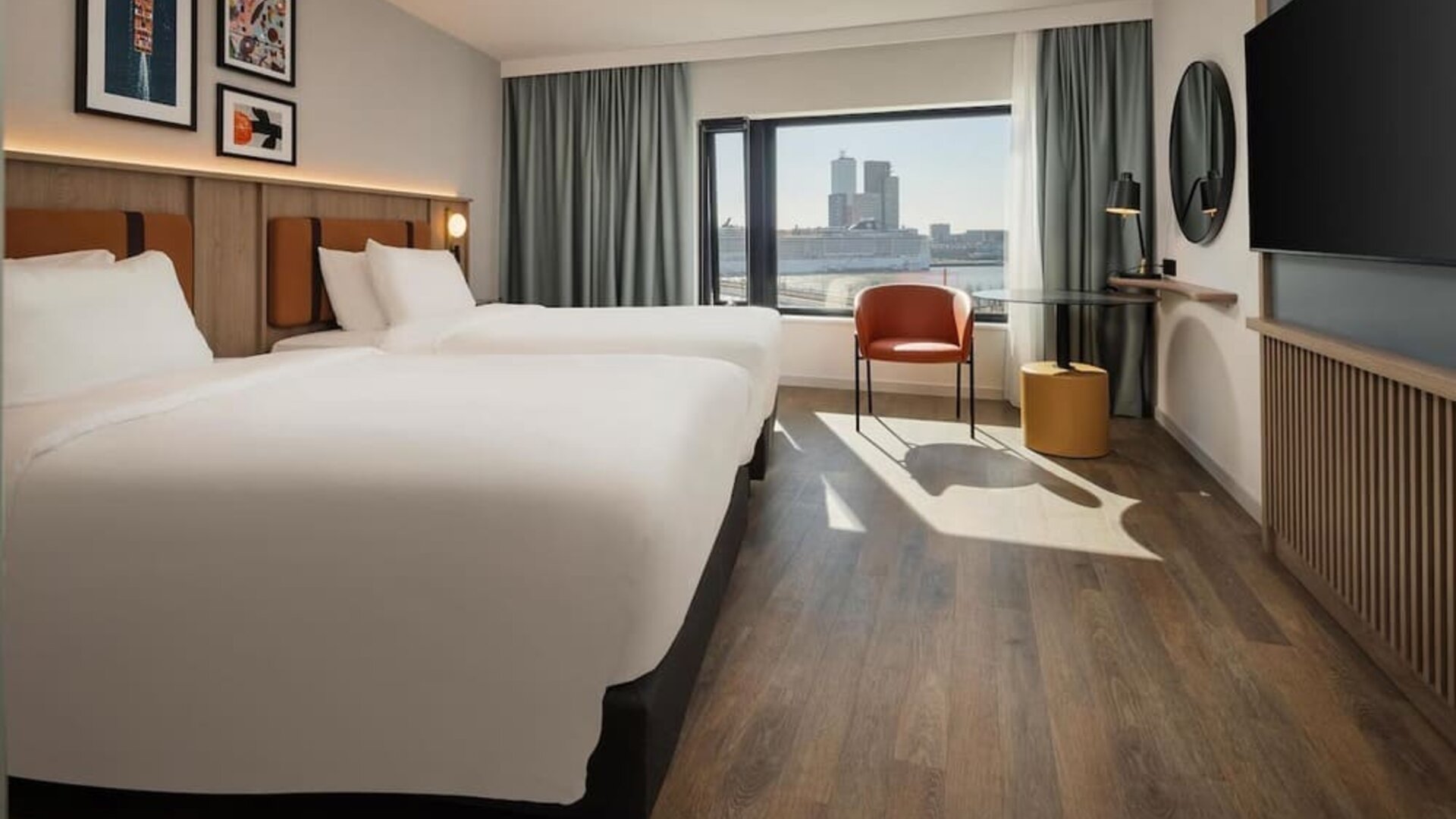 Day use room with two beds and TV at DoubleTree By Hilton Rotterdam Centre.