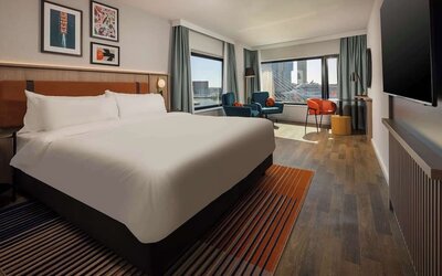 Day use room with natural light and TV at DoubleTree By Hilton Rotterdam Centre.