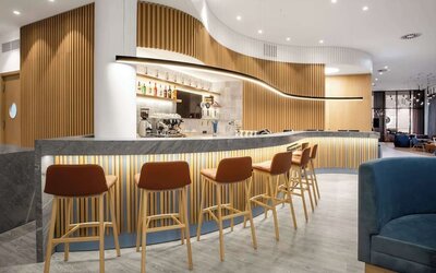 Cozy hotel bar and lounge at Hampton By Hilton Tallinn.