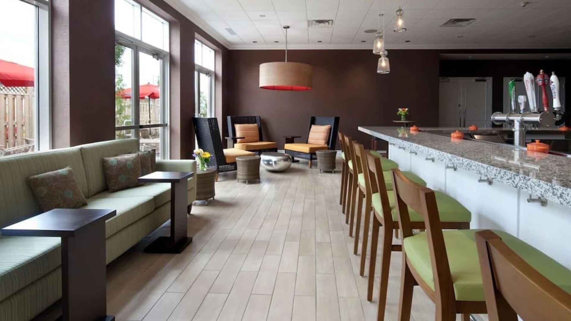 Cozy hotel bar and restaurant at Hilton Garden Inn Montreal Airport.