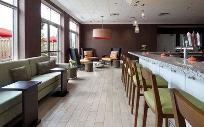 Cozy hotel bar and restaurant at Hilton Garden Inn Montreal Airport.