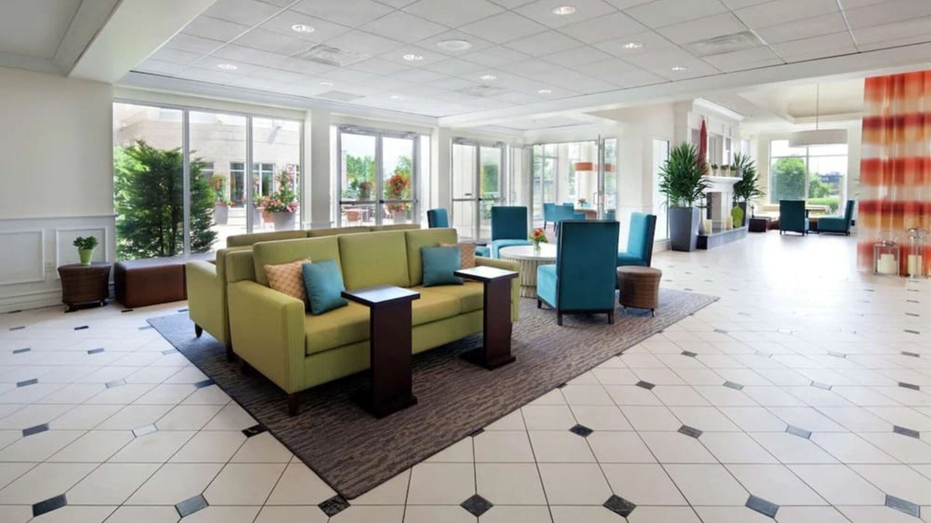Lobby and lounge area at Hilton Garden Inn Montreal Airport.