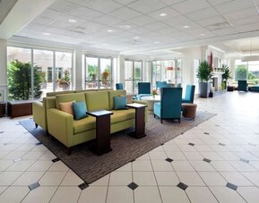 Lobby and lounge area at Hilton Garden Inn Montreal Airport.