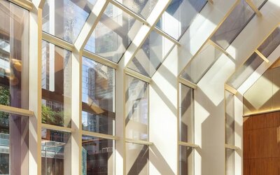 Bright atrium with floor-to-ceiling windows and natural light at Hyatt Regency Times Square.