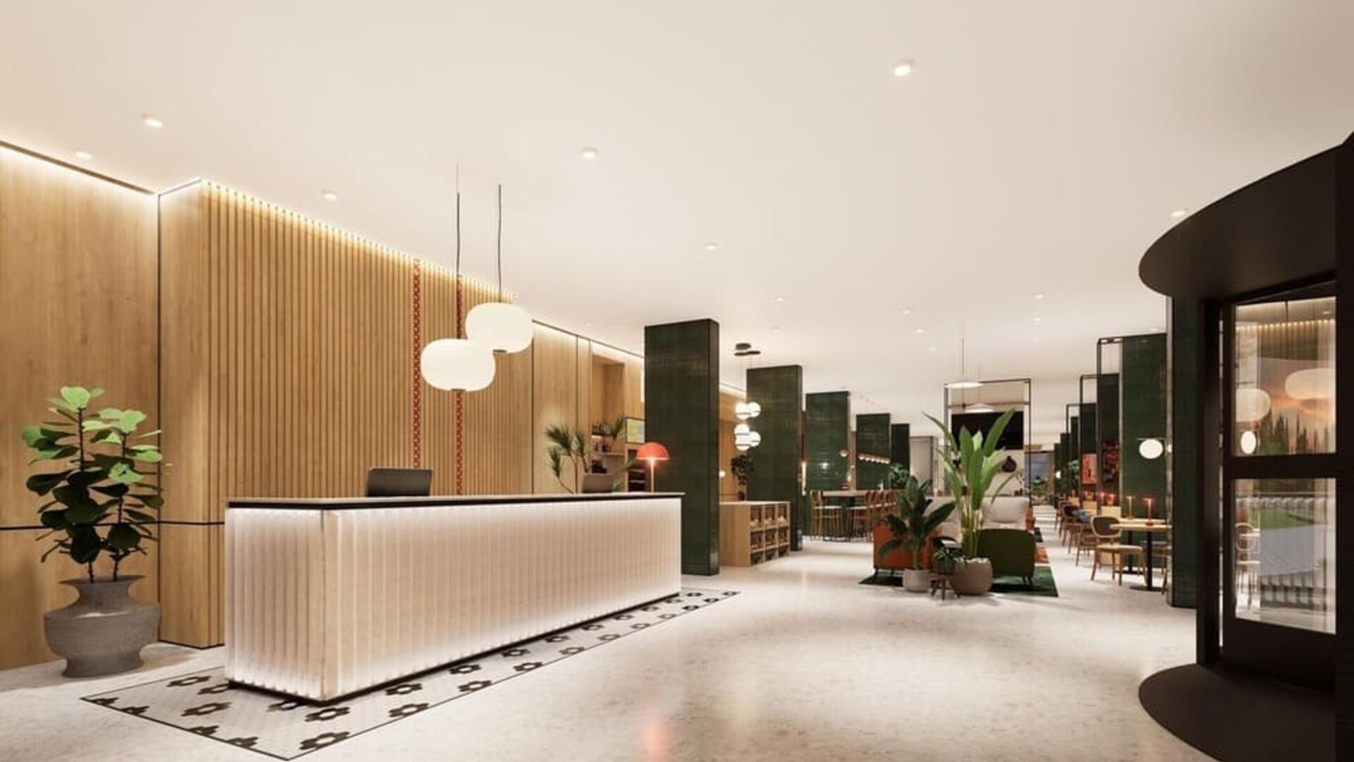 Bright reception hall with illuminated front desk, wood paneling, lounge seating, and dining area
