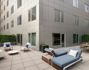 Outdoor terrace lounge with seating and relaxation area at Hyatt Union Square New York.