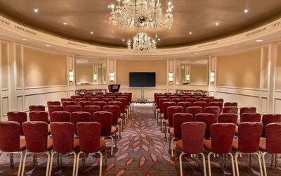 Ballroom-style meeting and event space with chandelier lighting and theater seating at Hyatt Regency Boston.