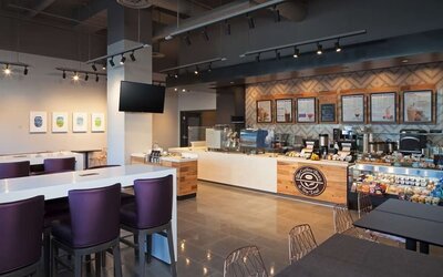 On-site coffee shop, perfect for coworking at H Hotel Los Angeles, Curio Collection By Hilton.
